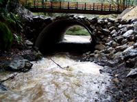 ../fcsmp/tour/graham_gulch_culvert_1st_flow_after_replace,_nov_2005_.jpg + 187 KB